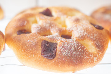 Greek tsoureki, Easter sweet bread, cozonac. Braided round brioche with guava, festive traditional dessert, top view