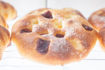 Greek tsoureki, Easter sweet bread, cozonac. Braided round brioche with guava, festive traditional dessert, top view