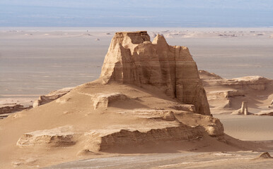 A weathered rock formation in the Lut desert. Located nearby Kerman city Lut desert is on of the...