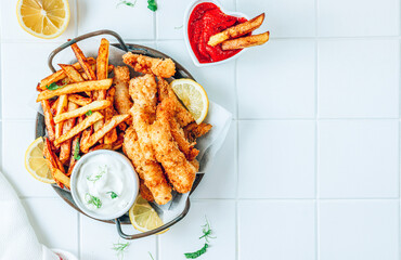 British Traditional Fish and chips with ketchup and tartar sauce