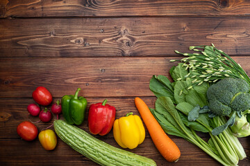Vegetables on wood background with copy space for text
