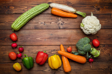 Vegetables on wood background with copy space for text
