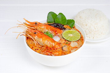 Tom Yum Goong or Shrimp soup spicy sour Soup Traditional food in Thailand contains chili, lime,...