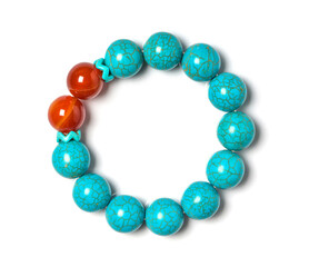 Turquoise with Carnelian Jewel or gems bracelet on white background. Collection of natural gemstones accessories. Studio shot