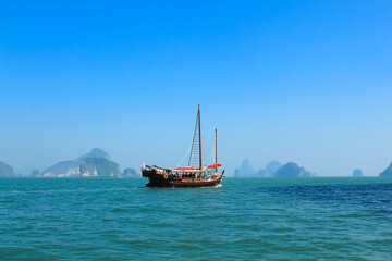 Fototapeta na wymiar The sailing ship around Phang Nga bay, Phuket, China