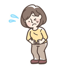 腹痛でお腹をおさえている女性
