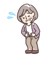 腹痛でお腹をおさえている女性