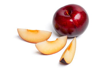 Naklejka na ściany i meble Fresh red plums fruit with slice on white background.