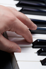 Playing with one hand on piano