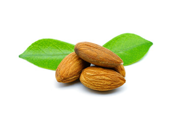 Close up of almonds with leaves, isolated on white background