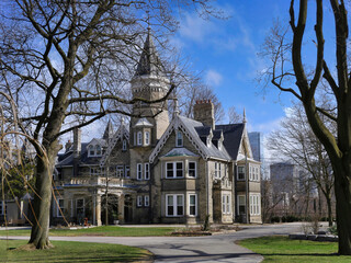 A gothic style mansion built in 1860 on a hill overlooking downtown Toronto, now used for a school - obrazy, fototapety, plakaty