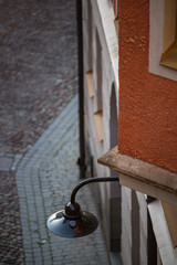 Stockholm, Sweden A lampost on a building on Pryssgrand on Sodermalm.