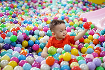 Fototapeta na wymiar A kid playing in the playground