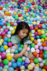 Fototapeta na wymiar A litle girl play in the playground