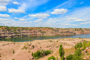 View of the lake at abandoned quarry on summer
