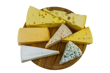 Set of various types of cheese on wooden cutting board isolated on white background. Top view