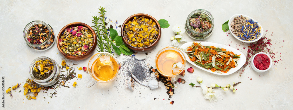 Wall mural herbal tea assortment on dark background.