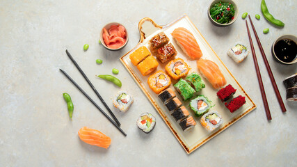 Fototapeta na wymiar Sushi assortment on light background.