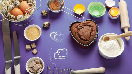 Freshly baked cake on blue background.
