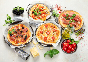Set of delicious homemade pizzas.