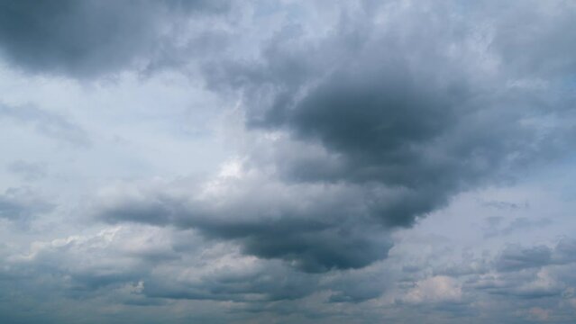 Clear blue sky with some white fluffy clouds. Natural heaven backdrop.