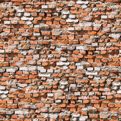 Red brickwork seamless background.