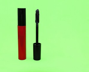 Obraz premium generic cosmetic used to beautify and harden eyelashes, makeup, eye mascara on green background