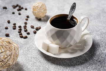 fresh hot black coffee in a glass on a light background