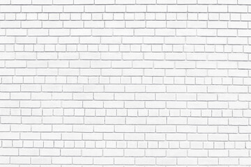 White painted old brick wall texture. Shabby rough whitewashed brickwork. Abstract light vintage textured background