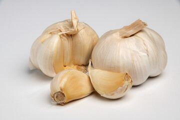 Raw garlic on a white background