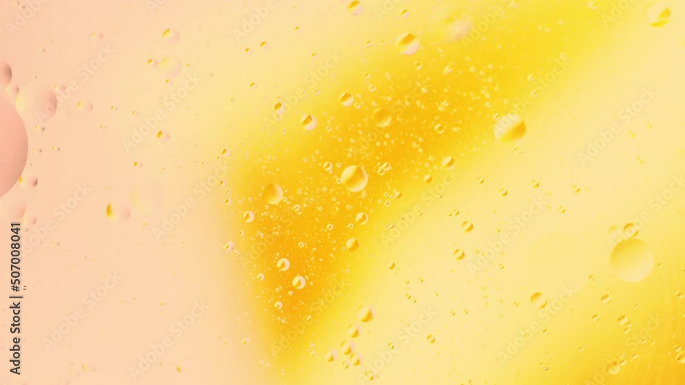 Poster real abstract colourful oil drops in water rotation with color gradient mixing background.