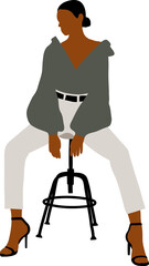 A black girl in a green blouse and white jeans sits on a round chair