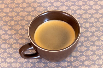 cup of black coffee isolated on a table