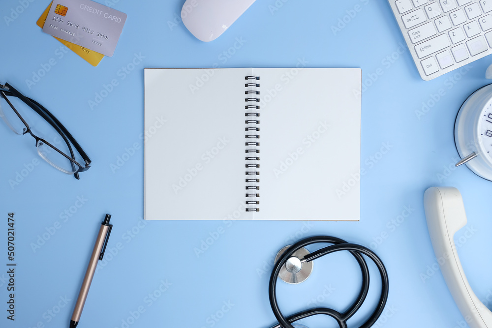 Poster mockup of a workspace desk in a flat lay top view. image of a workspace with a laptop, smartphone, c