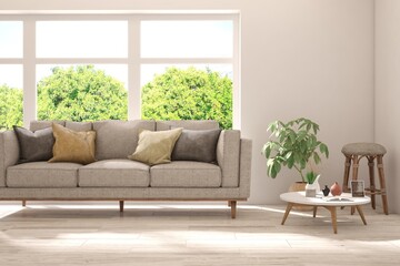 Minimalist living room in white color with sofa and summer landscape in window. Scandinavian interior design. 3D illustration