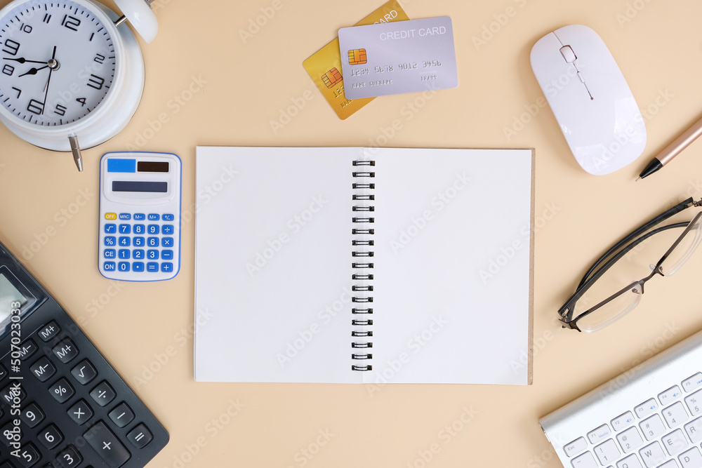 Poster mockup of a workspace desk in a flat lay top view. image of a workspace with a laptop, smartphone, c