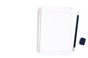 Notebook , Black pencil and black eraser isolated on white background