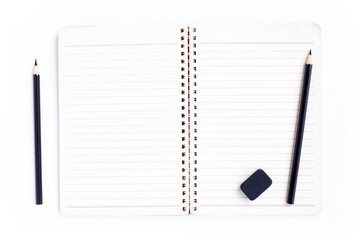 Notebook , Black pencils and black eraser isolated on white background