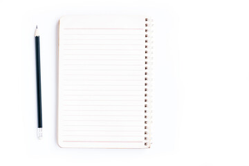 Notebook and Black pencil  isolated on white background