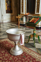Orthodox font in the church for the baptism of the baby