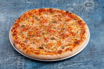 pizza on the wooden background