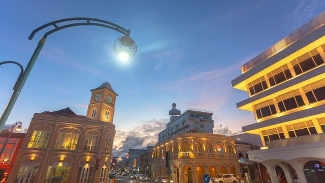time lapse clock tower a landmark of Phuket city.
Phuket,Thailand-May,25,2022:the architectural style in Phuket city was built in Chino portuguese style.
clock tower is a landmark of Phuket city.