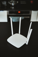 Side view of a modern WI-FI router for home usage with 4 antennas