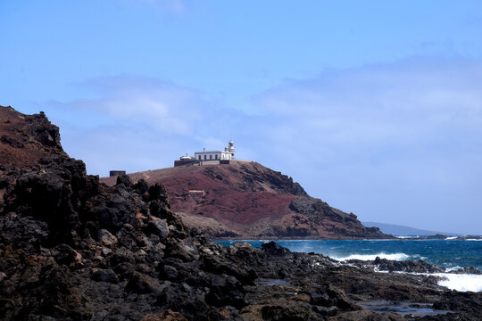 arinaga cliff and lighthouse background in canary island