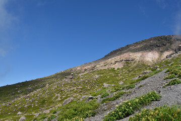 Fototapeta na wymiar Climbing mountain ridge