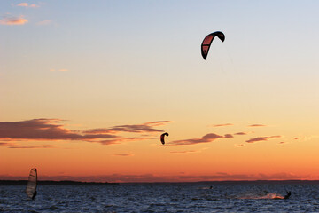 Wind and kite surf competition beautiful sky in background