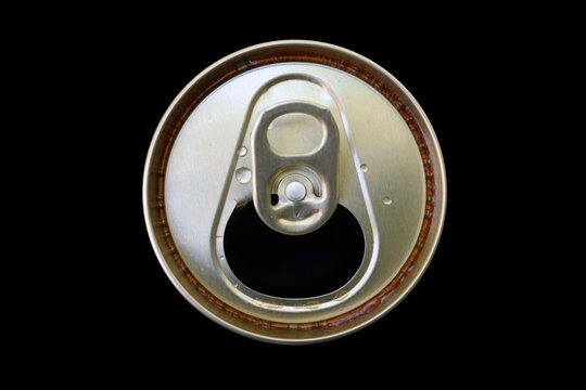 Close Up Of Aluminum Opened Cans With Some Drink And Water Drop On Cans On Black Background, View From The Top