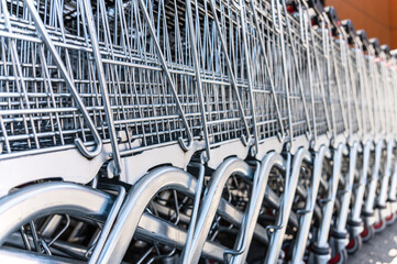 Shopping carts in front of a discount store