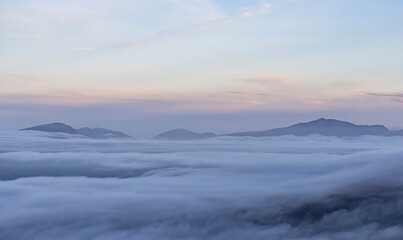 Snowdonia mountain landscape over cloud inversion winter weather, Wales UK