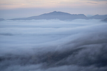 Mount Snowdon above the cloud at dawn with inversion weather